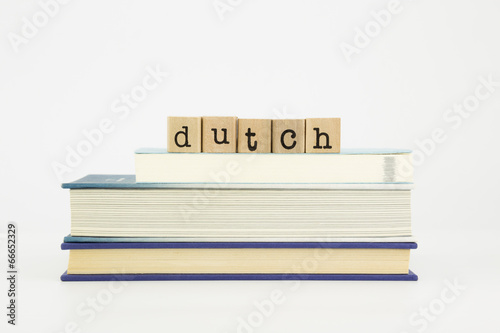 dutch language word on wood stamps and books