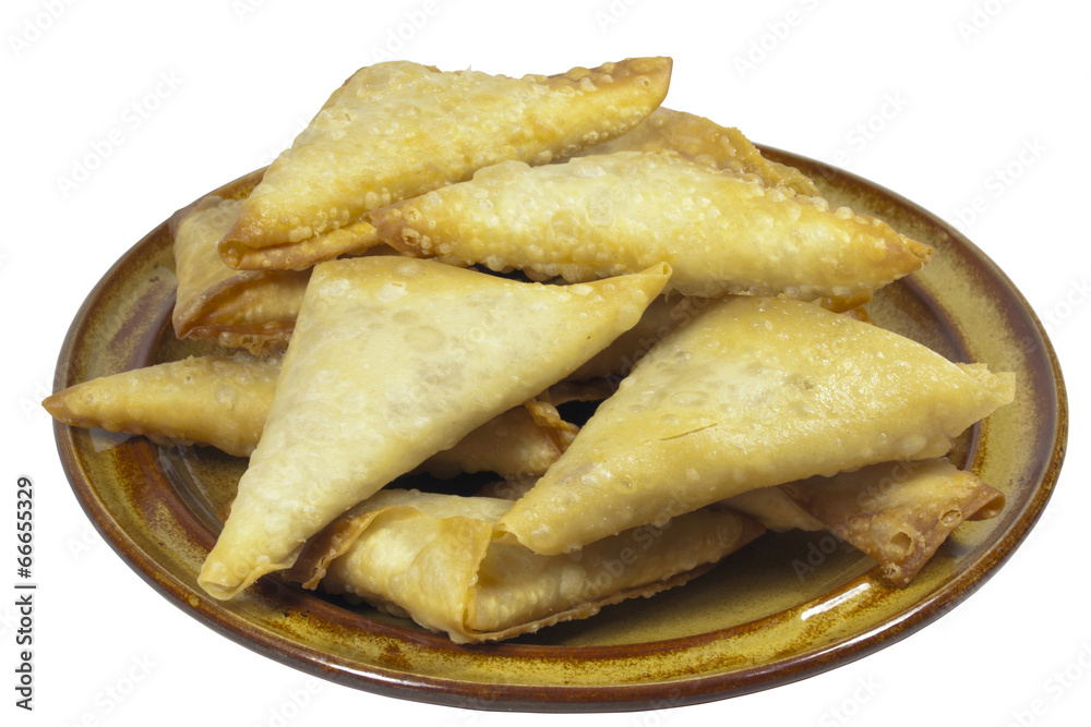 Brown Plate of Folded and Freshly Fried Samoosa Snacks Brown Plate of Folded and Freshly Fried Samoosa Snacks