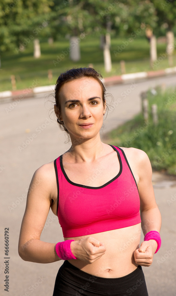 Fototapeta premium Young woman running