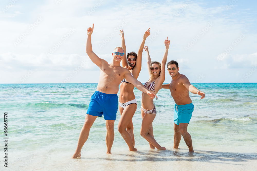 young happy friends havin fun on the beach young happy friends havin fun on the beach