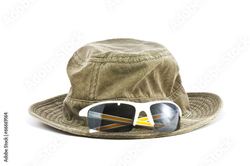 hat and sport sunglasses isolated on white background