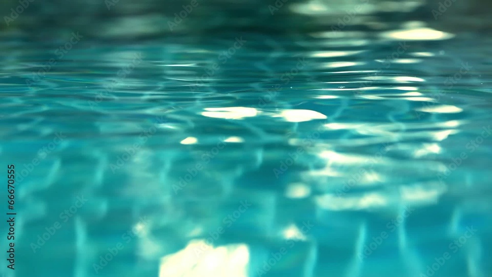 Shining blue water ripple in pool at sunset time. Video shift Shining blue water ripple in pool at sunset time. Video shift
