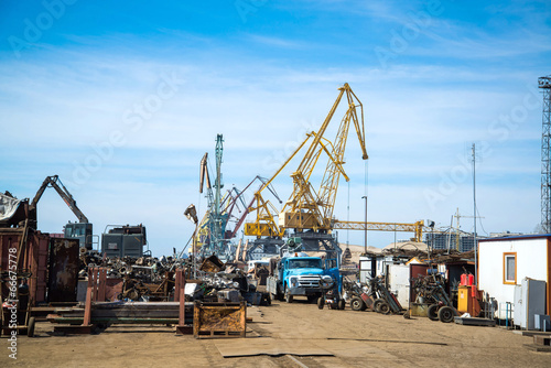 Cranes and junk in port