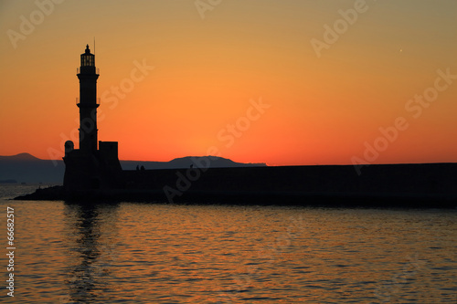 Dusk at harbor with lighthouse Chania Crete