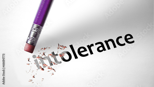 Eraser deleting the word Intolerance photo