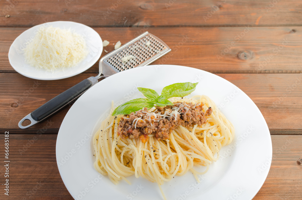 Spaghetti Bolognese on wood table Spaghetti Bolognese on wood table