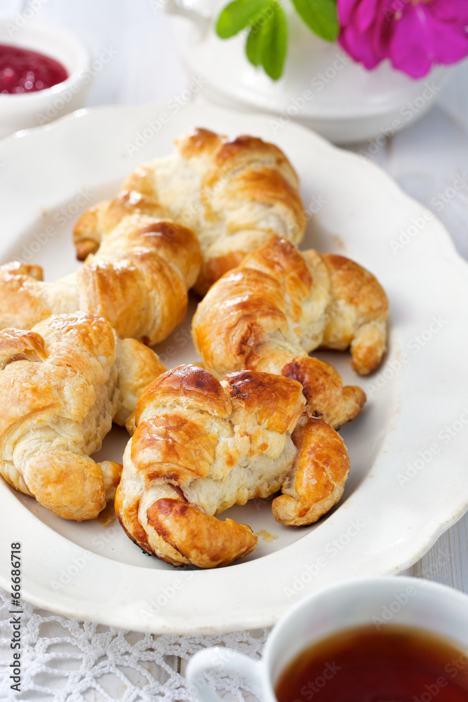 Homemade croissants with rose jam
