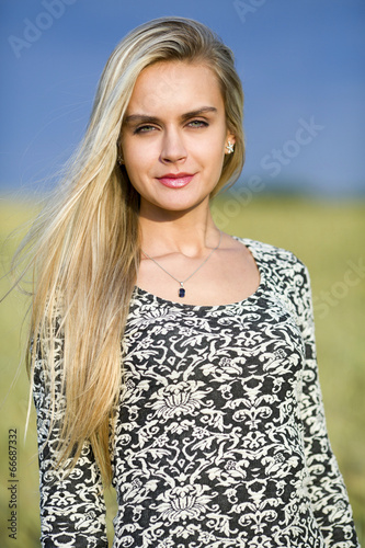 Beautiful teenage girl outdoors enjoying nature