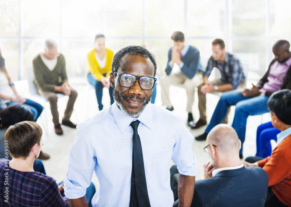 African Descent Man and Praying Group of People African Descent Man and Praying Group of People