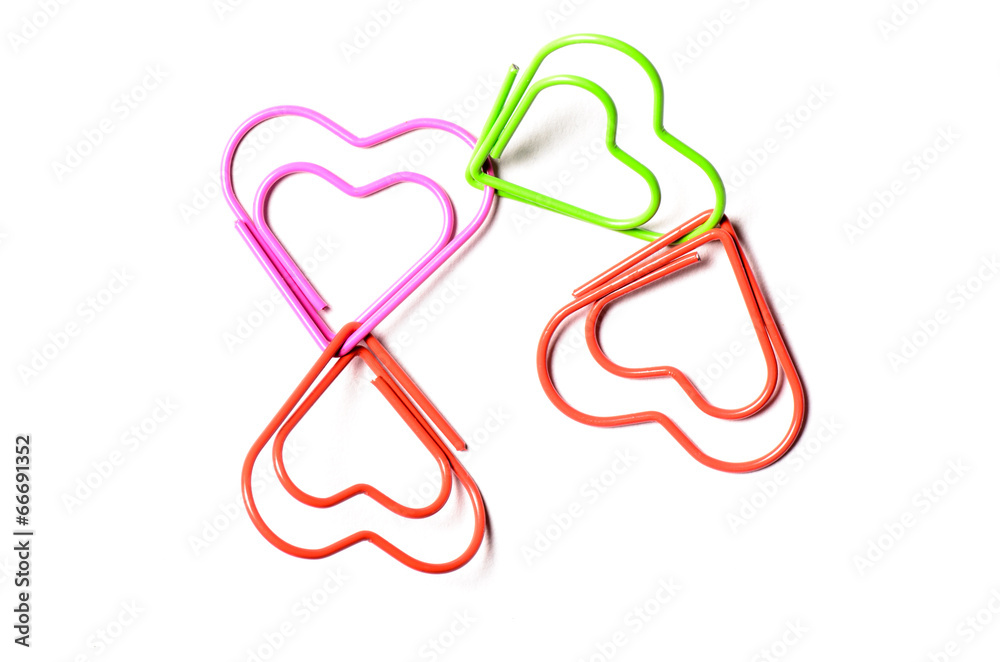 Heart shaped paper clips connected to each other Heart shaped paper clips connected to each other