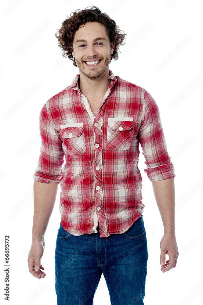 Smiling young casual man posing Smiling young casual man posing