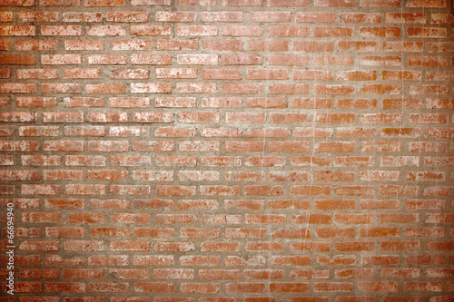 Weathered stained old brick wall background