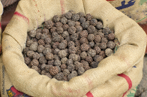 Rudraksha tree fruits nuts in sack, Asia market, India photo