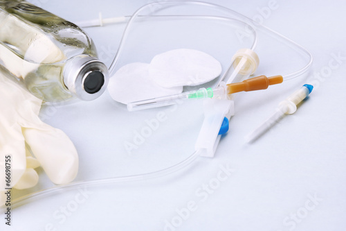 Disposable infusion set on grey background