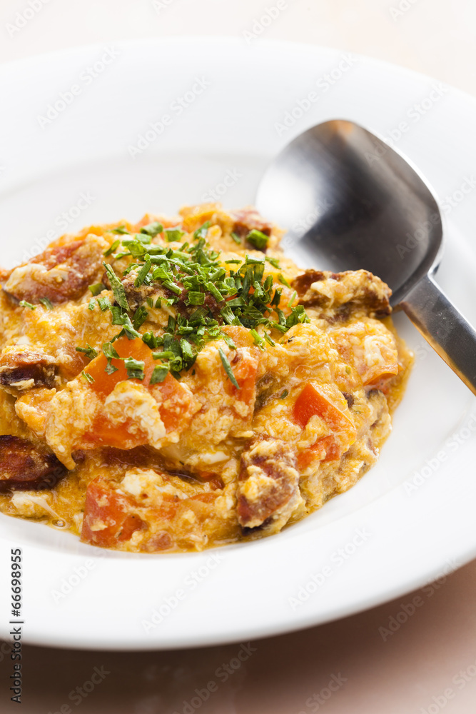 meal called leco (mixture of vegetables and eggs with sausage) meal called leco (mixture of vegetables and eggs with sausage)