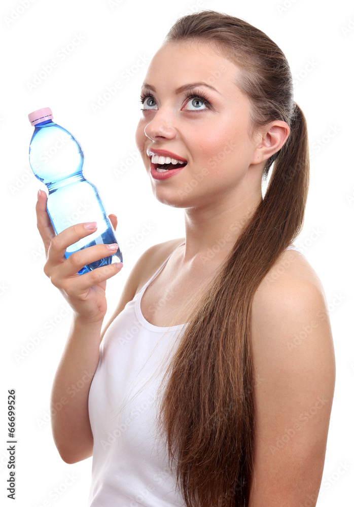Beautiful girl drinks water, isolated on white Beautiful girl drinks water, isolated on white