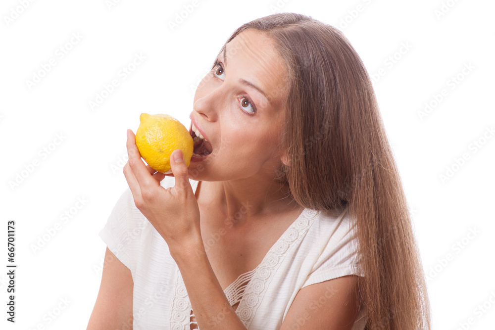 young woman holding a lemon young woman holding a lemon