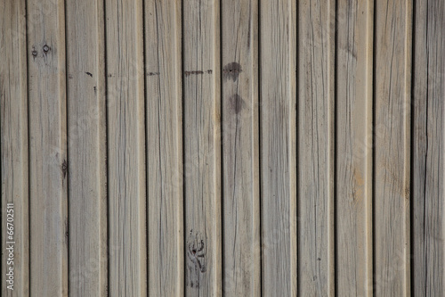 old planks with peeling brown paint