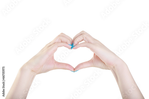 Beautiful female handslike a heart-shaped  isolated on white