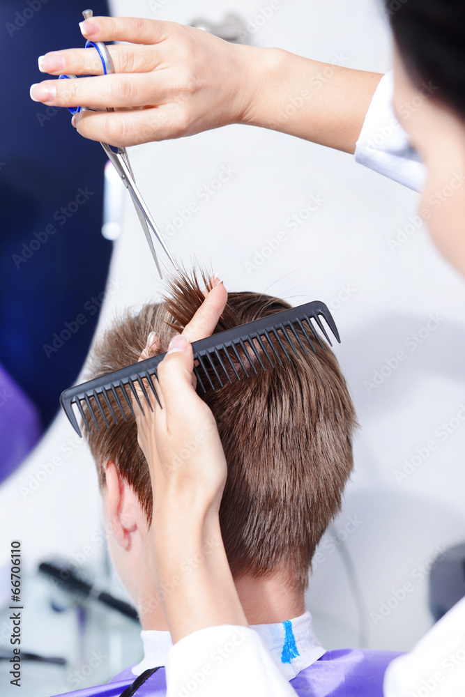 Naklejka premium Young man in beauty salon