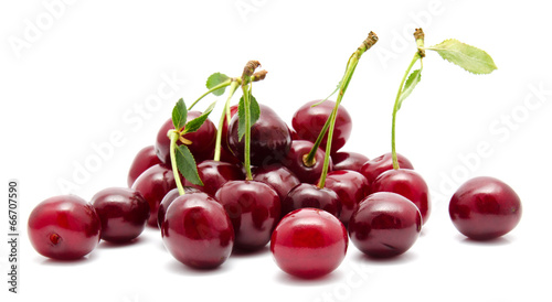 Juicy cherry with leaf isolated