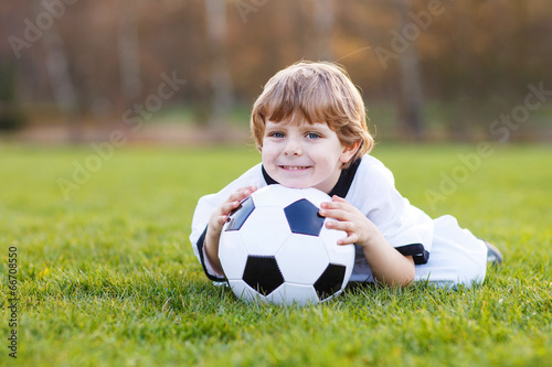 Little fan boy at public viewing of soccer or football game © Irina Schmidt