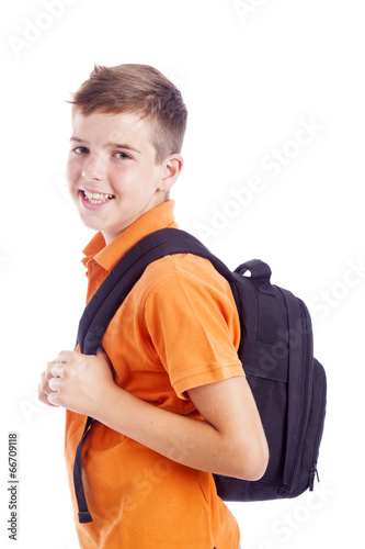 Schilderij op canvas Portrait of a school boy with backpack, isolated on white backgr