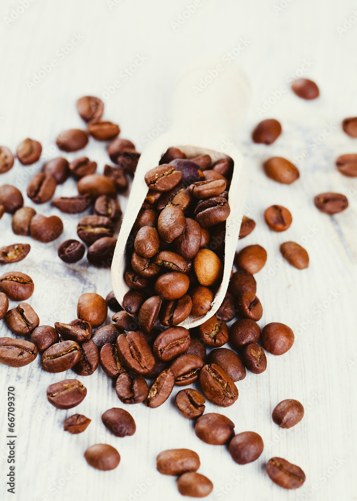 coffee beans on wooden surface