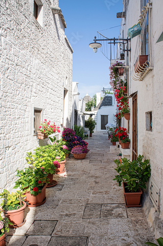 An alleway in Alberobello Puglia, Italy photo