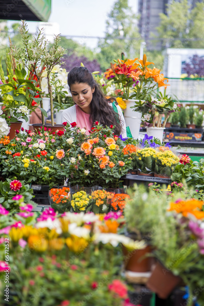Young woman buying flowers Young woman buying flowers