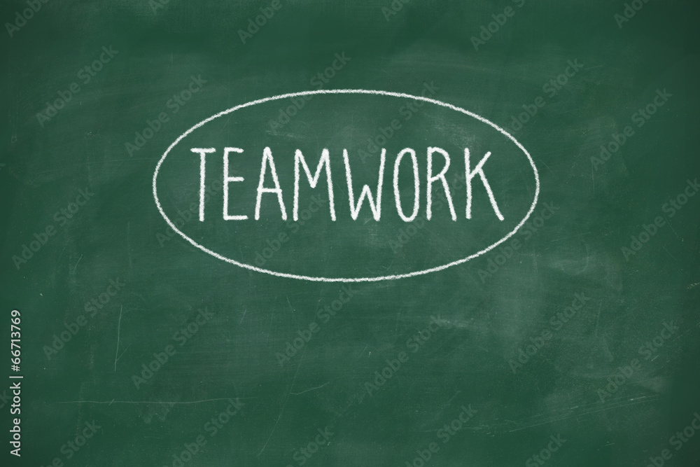 Fototapeta premium Teamwork handwritten on blackboard