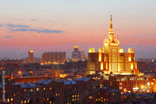 Building of Hotel Ukraine with beautiful illumination at evening