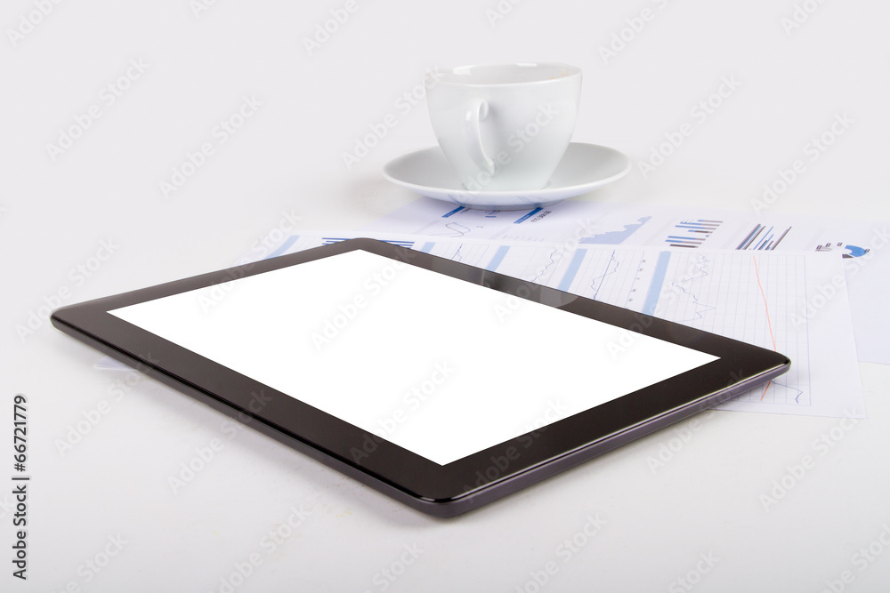 Tablet, Tea on Financial Graph Charts