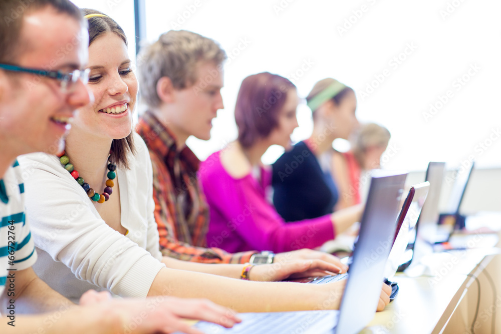 Group of college/university students in in a classroom Group of college/university students in in a classroom