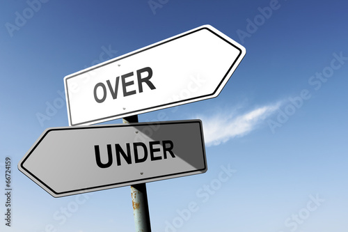 Over and Under directions. Opposite traffic sign.