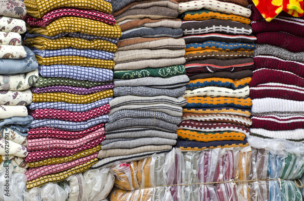 Colorful stacked fabric in  big market , India