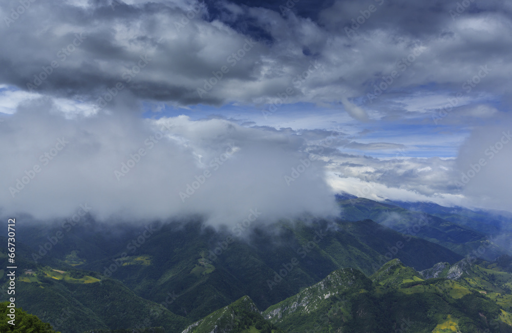 Beautiful mountain scenery in the Alps in summer and clouds Beautiful mountain scenery in the Alps in summer and clouds
