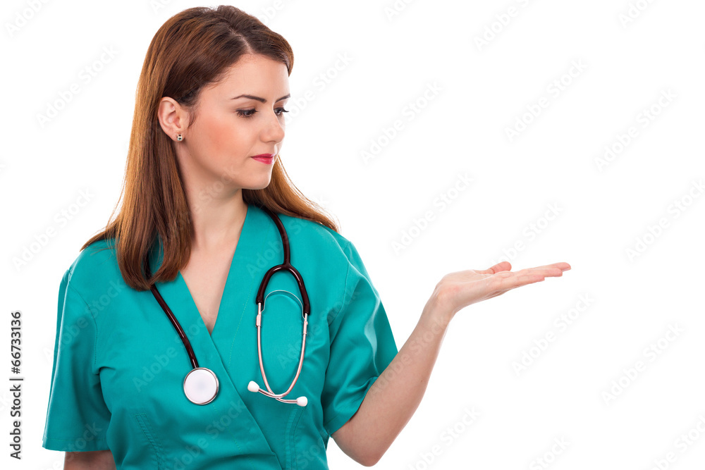 Portrait of young female doctor with open palm Portrait of young female doctor with open palm