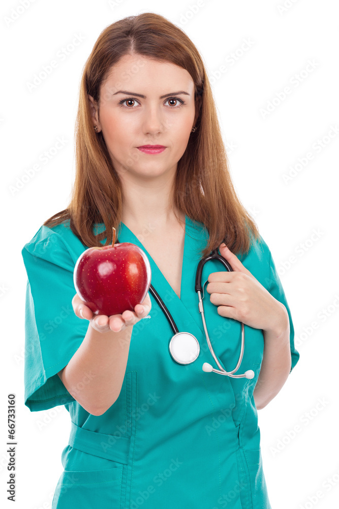 Female doctor giving apple ,concept for healthy lifestyle Female doctor giving apple ,concept for healthy lifestyle