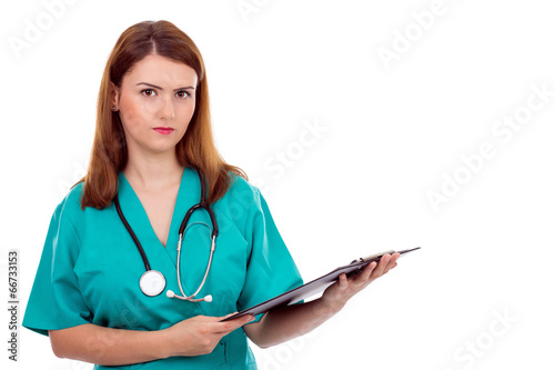 female doctor holding a clipboard