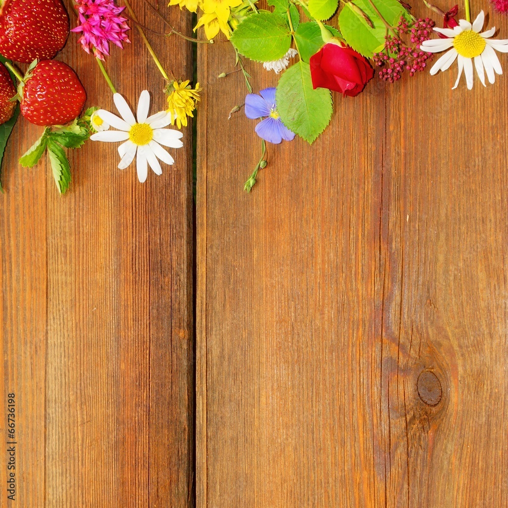 Flowers and Fruits on Grunge Wooden board Flowers and Fruits on Grunge Wooden board
