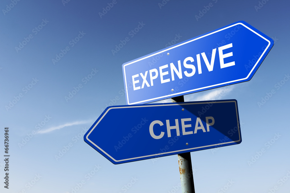 Expensive and Cheap directions. Opposite traffic sign. Expensive and Cheap directions. Opposite traffic sign.