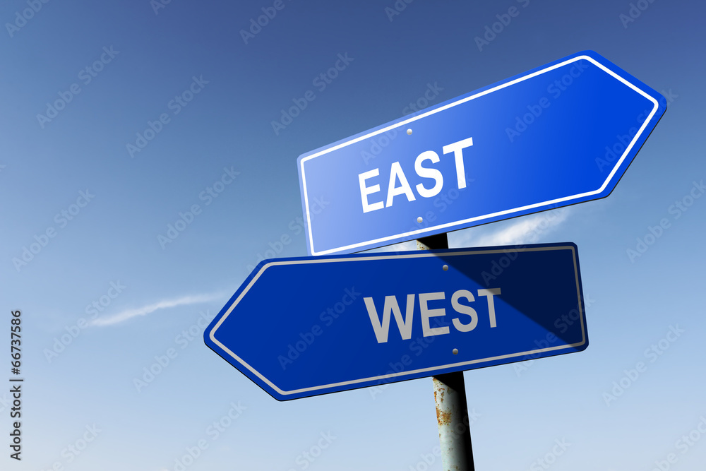 East and West directions.  Opposite traffic sign.