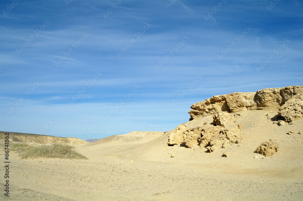 Stone and sandy Egyptian desert.