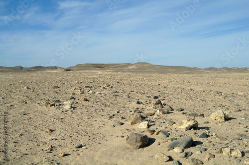 Stone and sandy Egyptian desert.