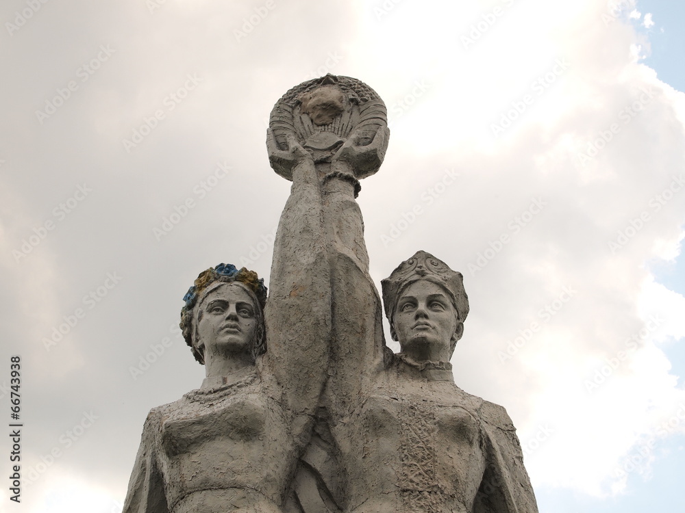 Soviet monument.  Russian and Ukrainian girls hold hands