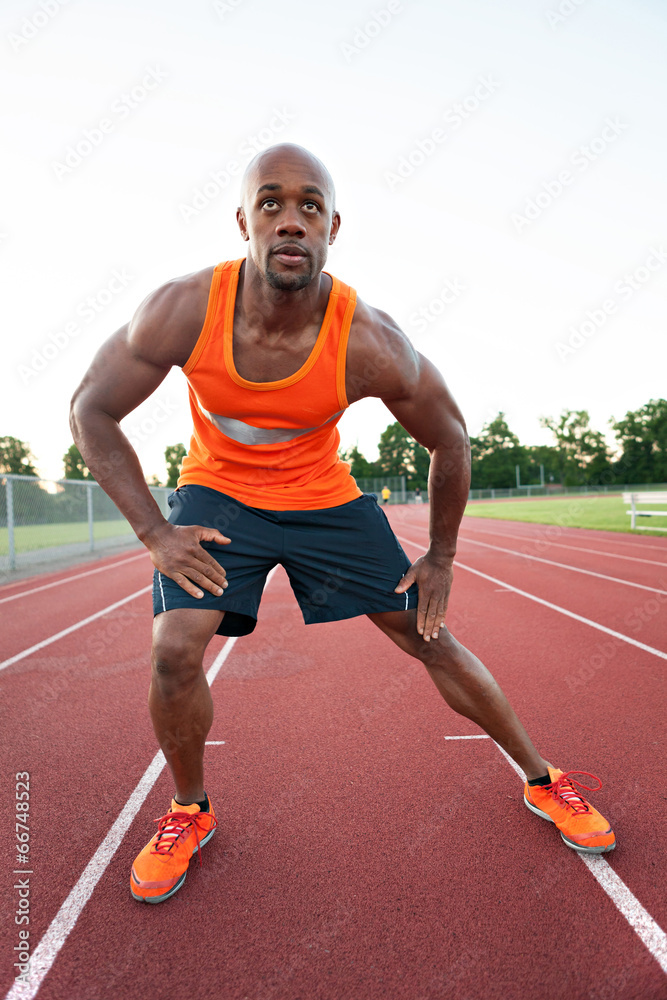 Obraz premium Runner Stretching His Legs