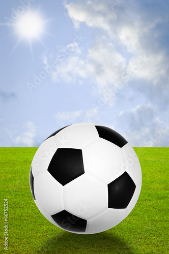Football with field and sky background © Beach boy 2024