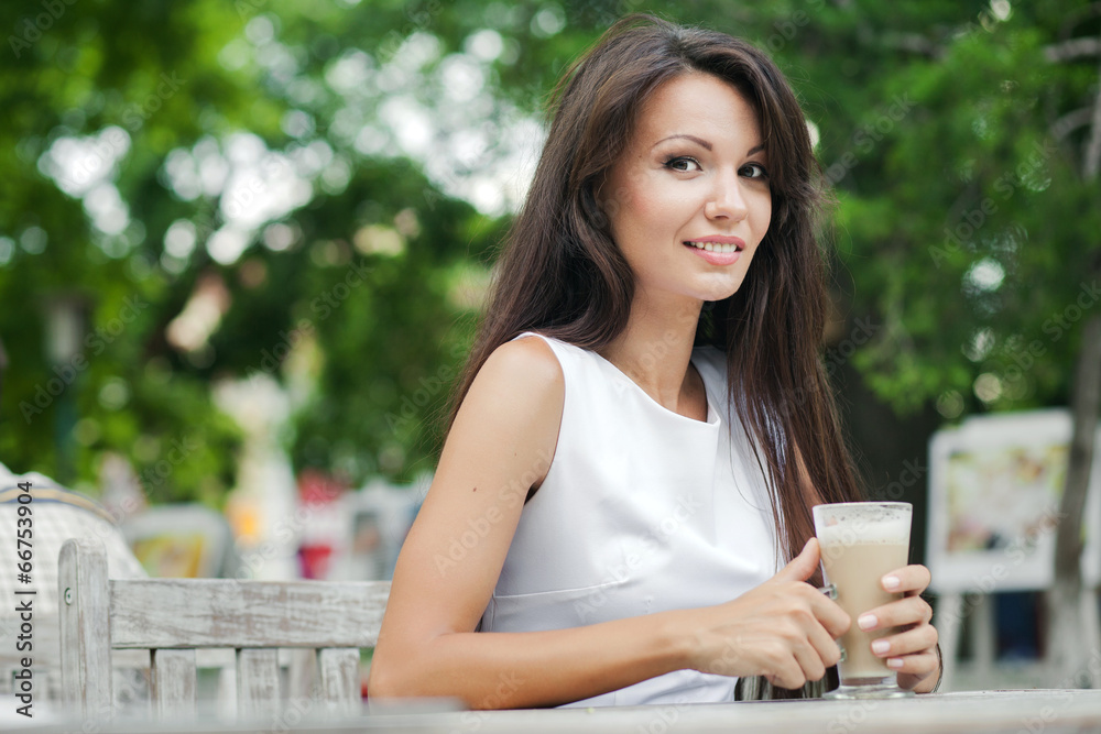 woman drinking coffee in the morning at cafe woman drinking coffee in the morning at cafe