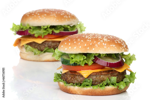 Two delicious hamburgers isolated on white background